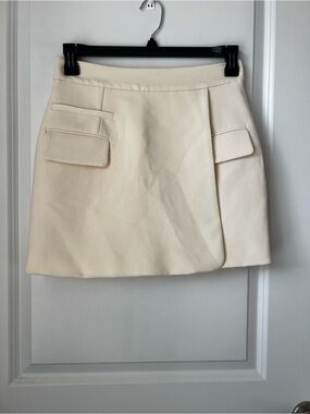 Cream Mini Skirt with Front Flap Pockets